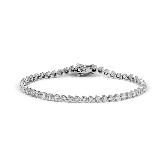 14K white gold tennis bracelet with round diamonds in a 3-prong style setting